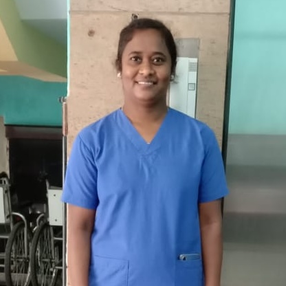 Silpa in her nursing scrubs